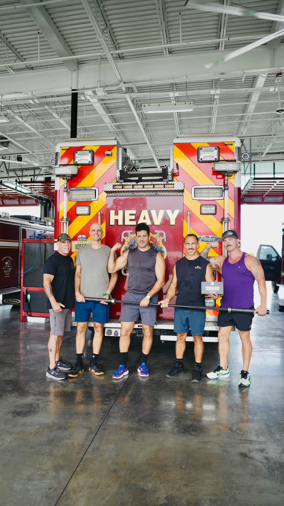 Black Anvil team firehouse group photo with Foundry Series Bar