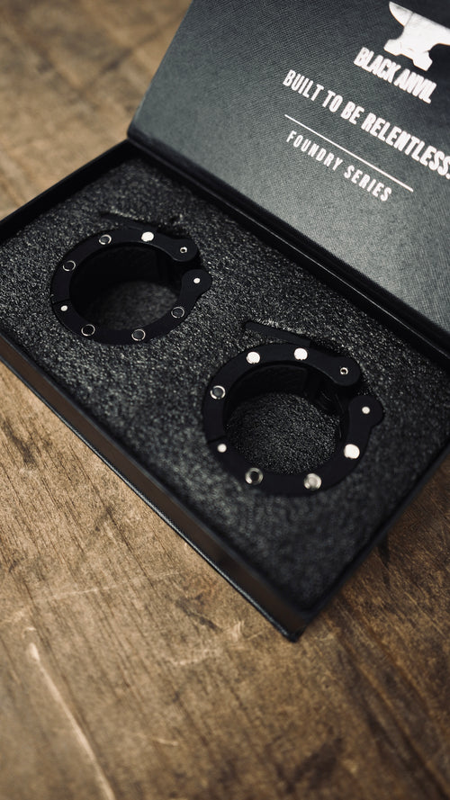 Black Anvil ForgeLock magnetic weight collars in premium packaging